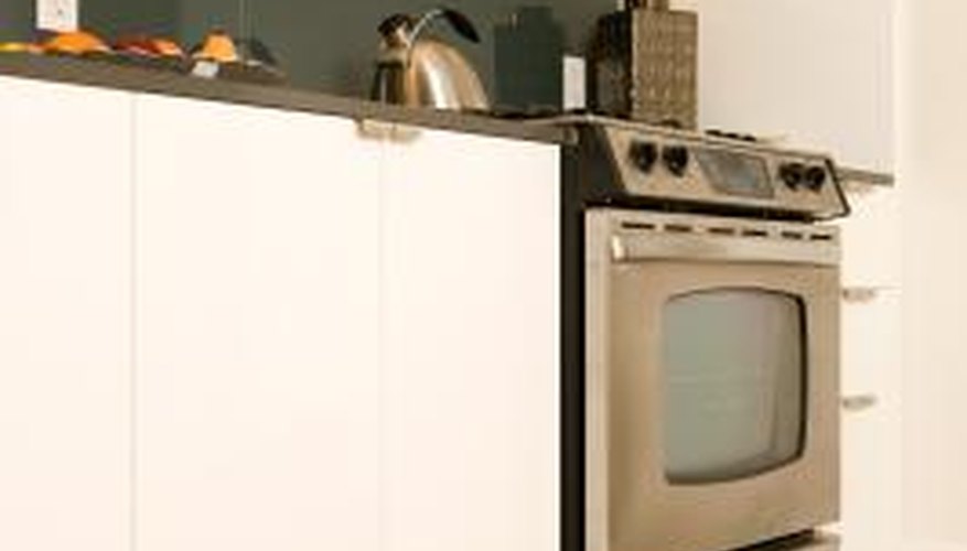 Follow basic safety procedures when connecting or disconnecting a high-voltage oven.