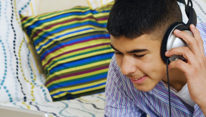 Use a computer to transfer music from a Kindle to an iPad.