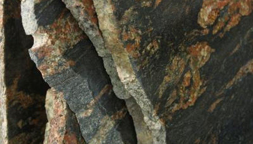 Slate tiles are fabricated of sedimentary deposits from riverbeds.