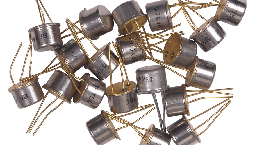 Early transistors were a fraction of the size of the vacuum tubes they replaced.