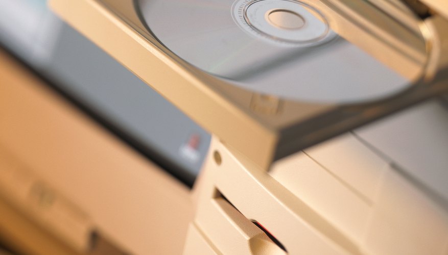 how to eject disc from apple dvd player