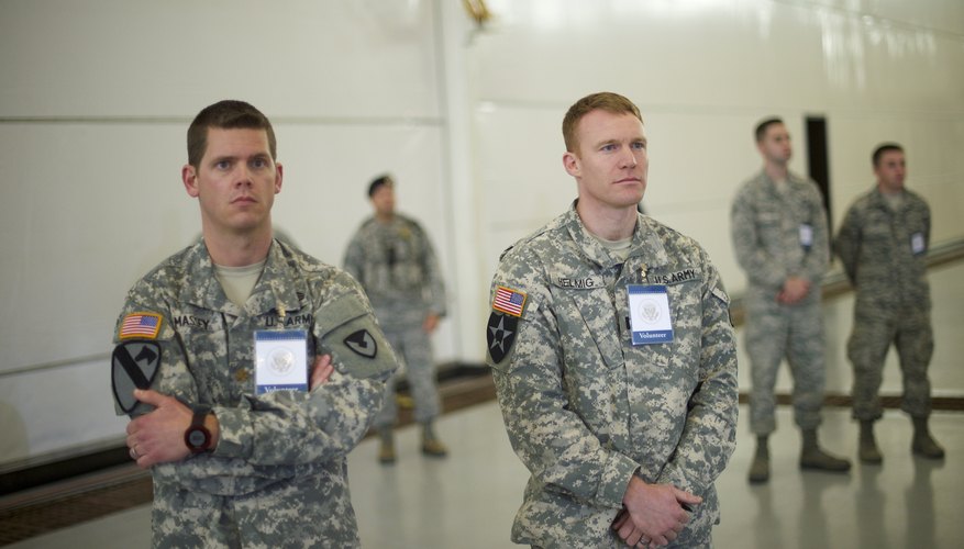 U.S. soldiers standing in waiting room.