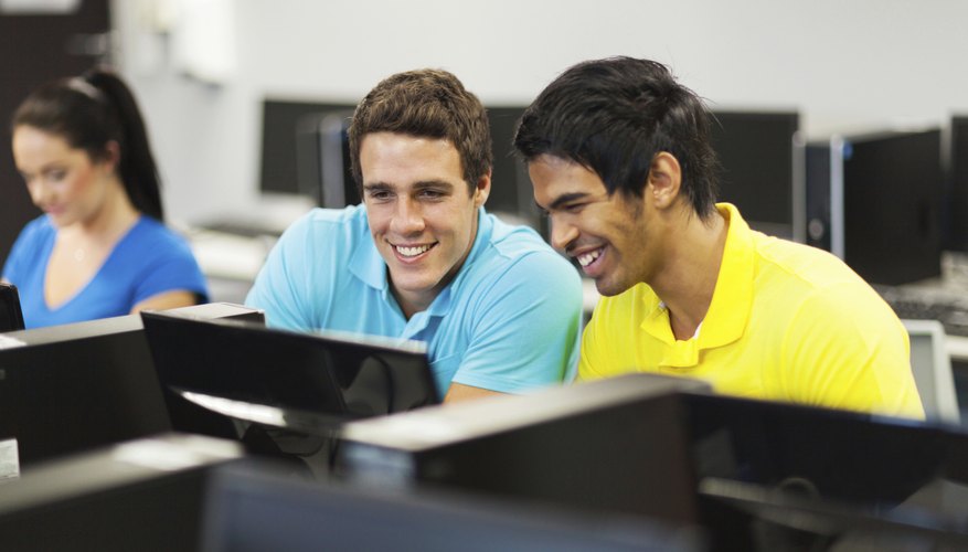 Students smiling in computer lab