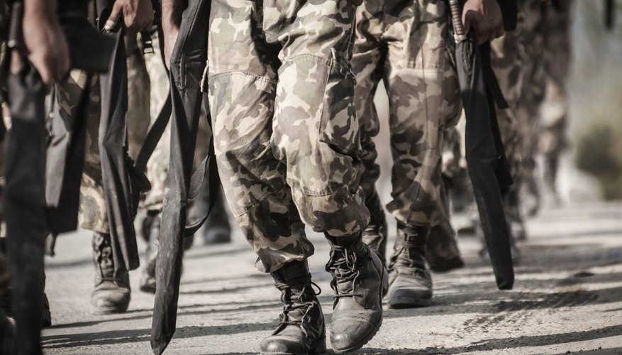 Military soldiers marching on foot
