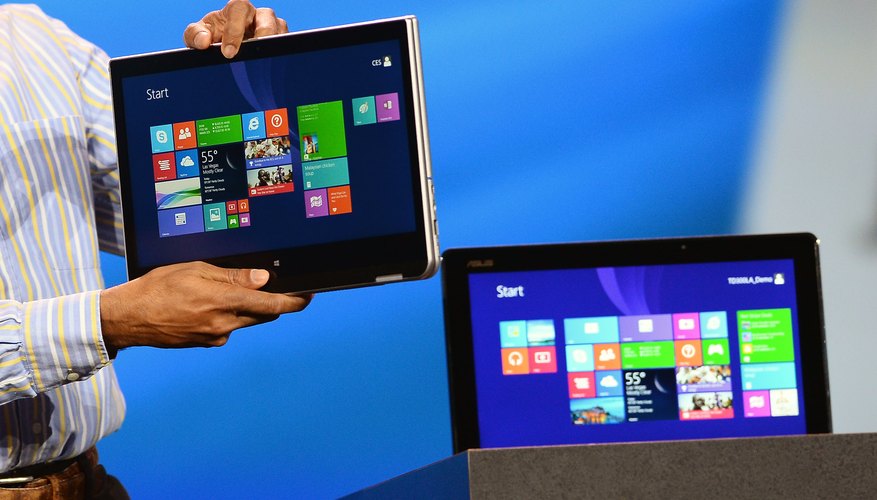 Tablets and laptops alike connect to the Internet via a wireless router.