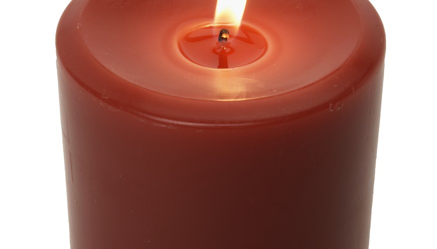 A red candle is often placed on the altar during Catholic mass.
