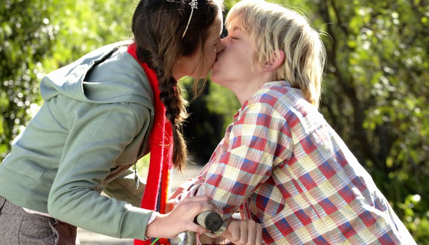 Take deep breaths to slow your heart rate when feeling nervous about a kiss.