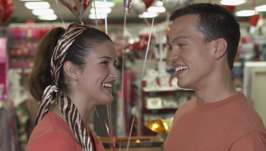 Heart-shaped balloons will symbolize your love to her.