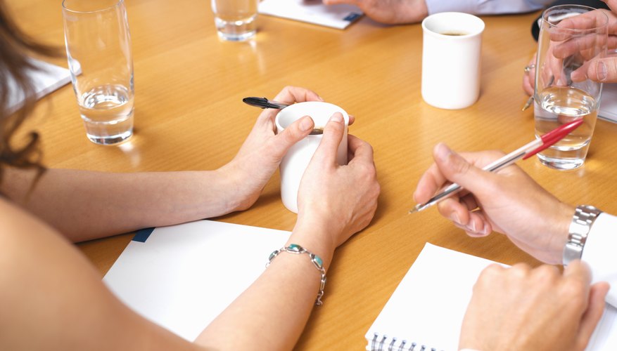 Close-up of meeting table during chair meeting.