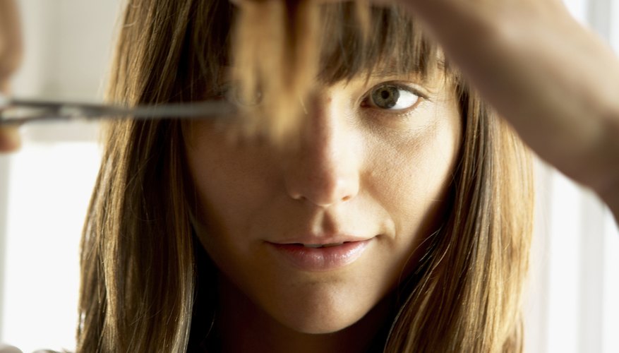 Change up your bangs by styling them to the side.