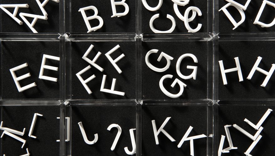 Small bins with alphabet letters.