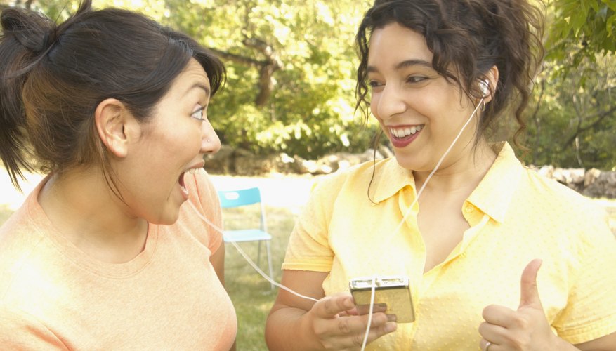 Give your friend a thumbs up for her taste in music.