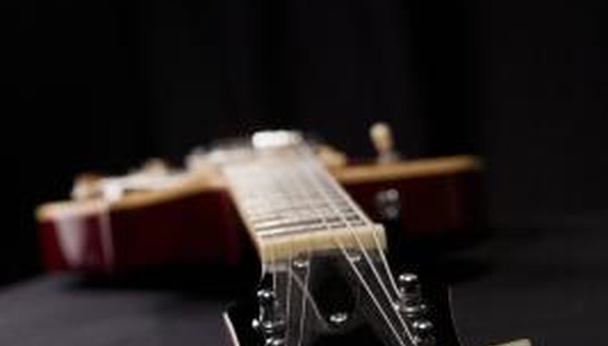 It's easy to remove an old waterslide decal from a guitar's headstock.