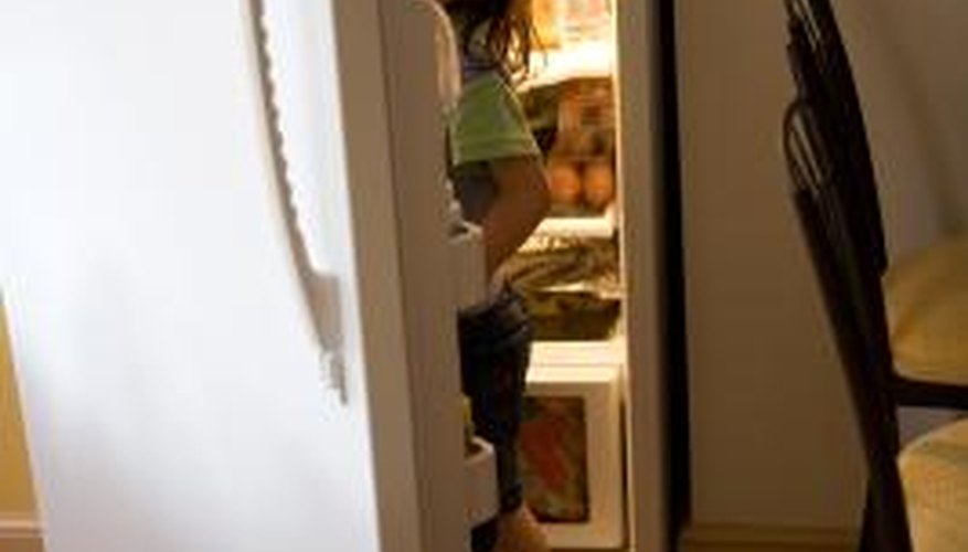 A refrigerator door can become warped and needs to be repaired.