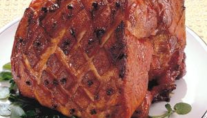 Score the fat on the side of the ham in a diamond pattern to add visual appeal.