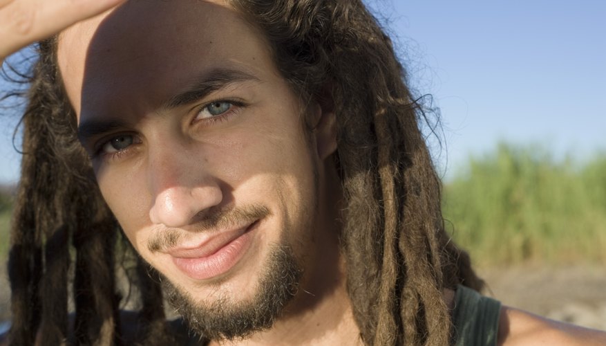 Palm rolling helps new dreads to keep their volume.