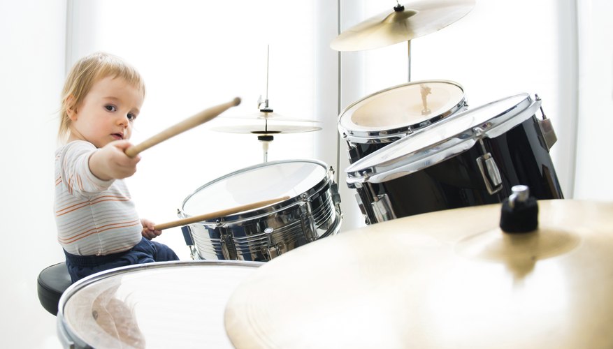A child playing a drum.
