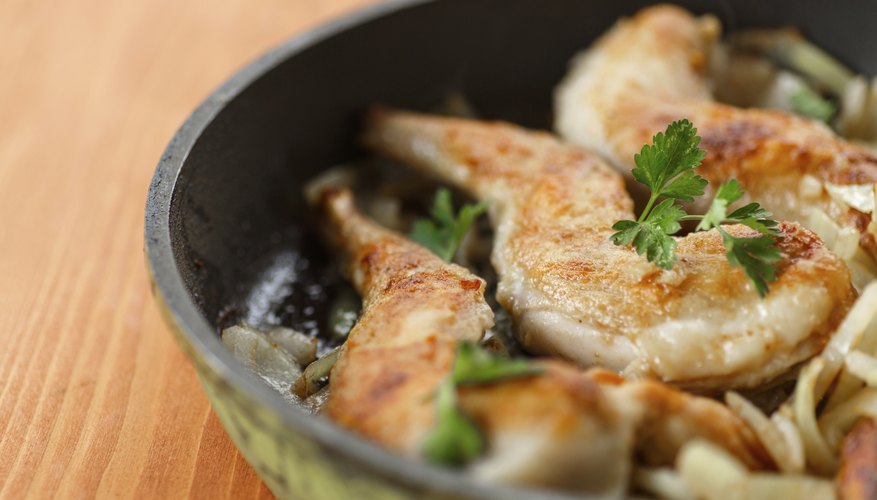 Roasted rabbit in a frying pan.