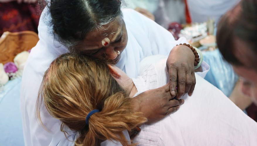 Mata Amritanandamayi gives unusual hugging darshans to her devotees.