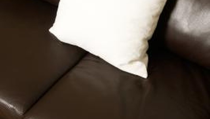 Remove creases from a leather sofa with an iron.