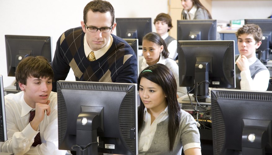 Students use computers as teaching aids to reinforce classroom lessons