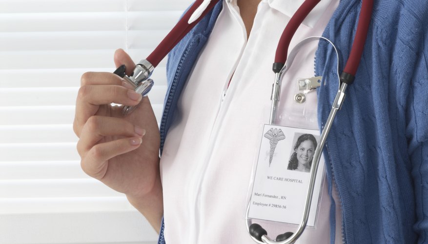 Close-up of identification card on doctor's blouse.