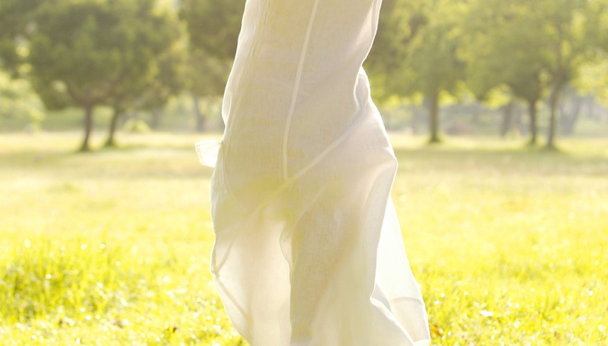 Moisturizing is key to preventing wavy, frizzy hair in hot climes.