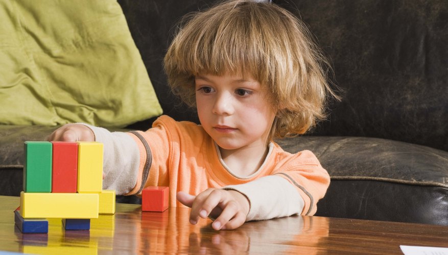 Create patterns from blocks using just two colors at first.