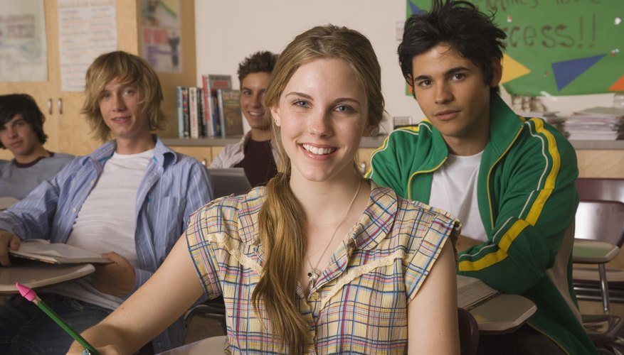 Smiling high school students in classroom
