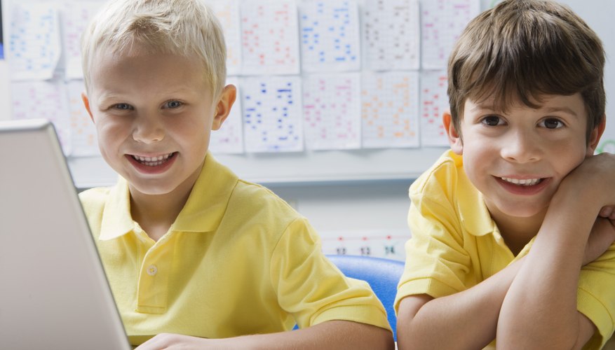 Two young boys in school.