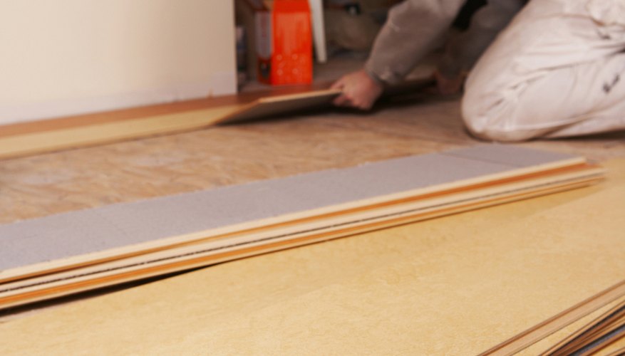 Lay the laminate flooring in sections.
