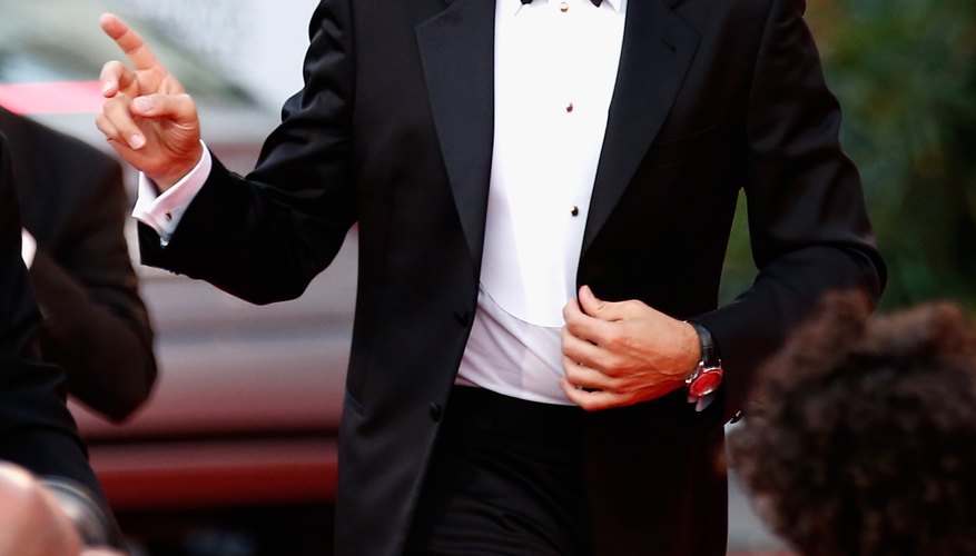 George Clooney sports a well-fitted tux with classically proper accessories.