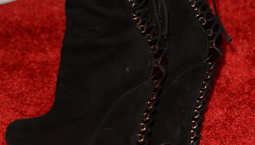 Matching your outfit's textures and colors with your wedge boot will bring your look home.