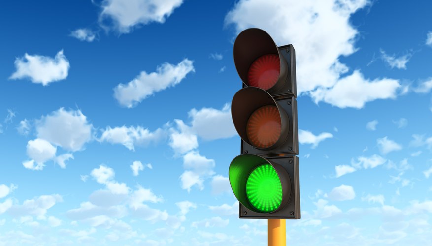 Play a game to teach children what the different colored lights mean.