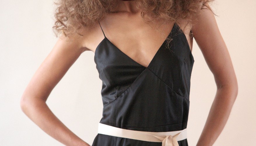 Big hair and a jumpsuit, like this look here by designer Rita Vinieris, would fit right at at a
