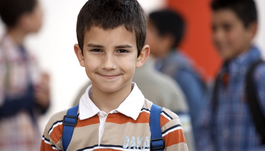Boy wearing backpack.