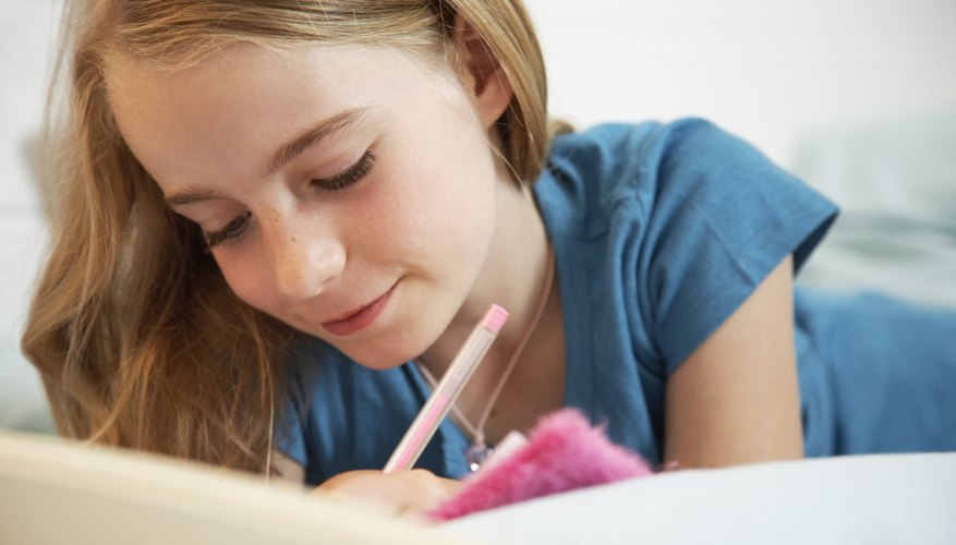 Girl writing down favorites list