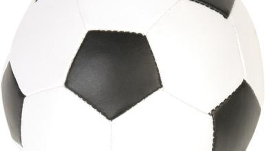 The outer covering of this football is comprised of many pentagons stitched together.