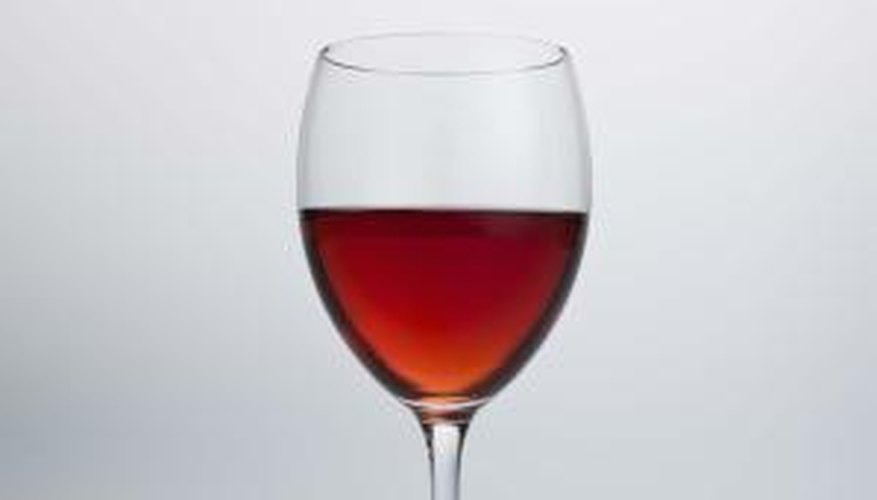 Remove the stem from an old or cracked wine glass and use the top or bottom in crafts.