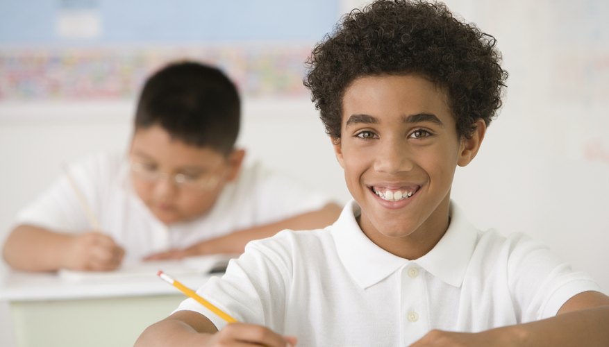 Smiling students in classroom.
