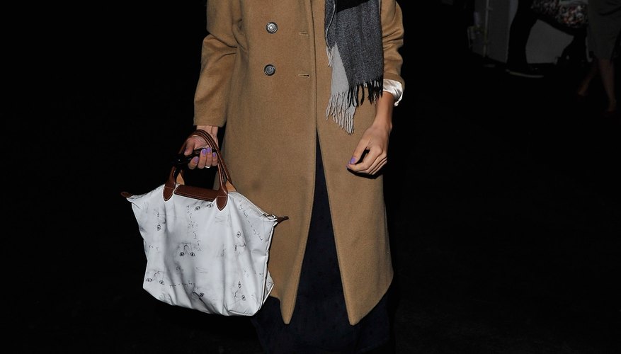 Alexa Chung color-blocks all the neutrals: black, white, tan, brown and gray.