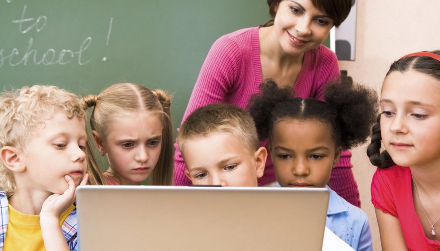 Teacher uses aids such as a computer to help keep all of her students engaged