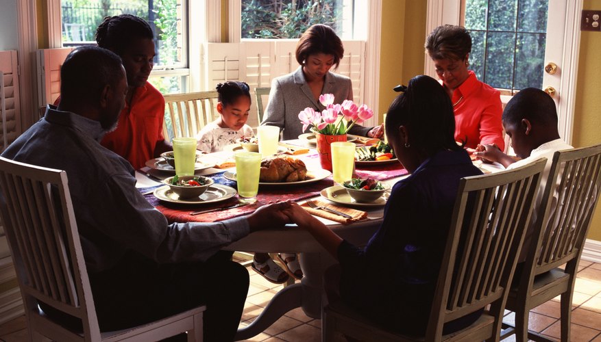 Family in prayer.
