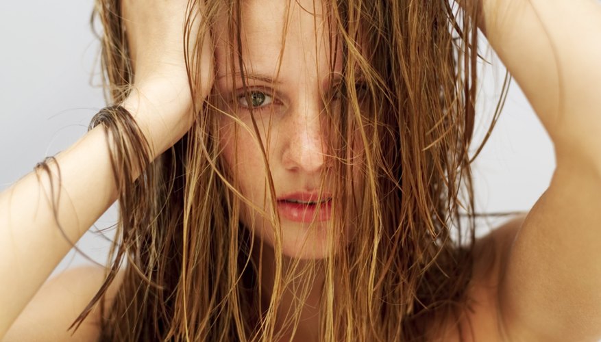 Scrunching your hair encourages body and texture without the damage from heat styling.
