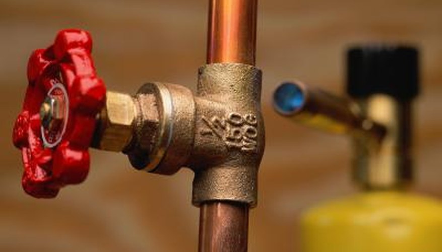 Copper pipes deliver water throughout a house.