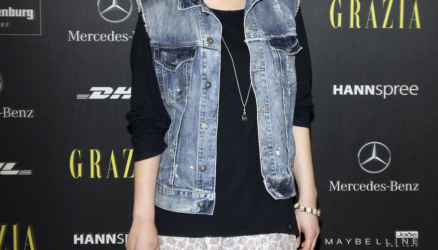 German actress Karolin Peiter rocks an acid-wash vest during Spring/Summer Fashion Week in Berlin.