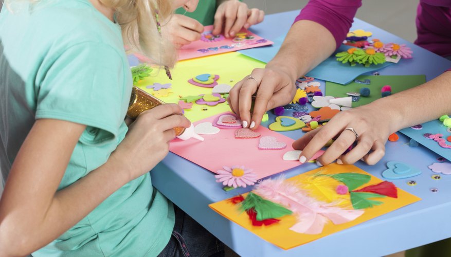 Teacher making crafts with students