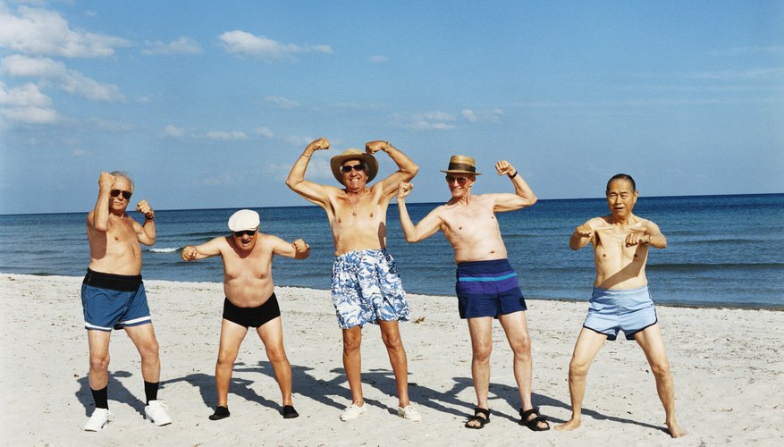 Group of senior men on beach vacation