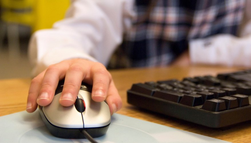 Close-up of student's hand on mouse