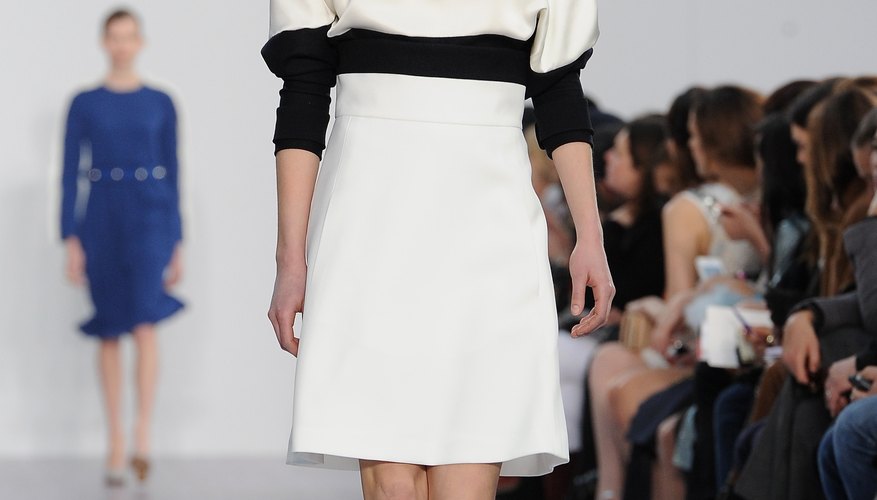 Pair a black and white sweater with a white skirt and heels for an easy and chic party look, as seen in Chloe's Fall/Winter 2013 collection.